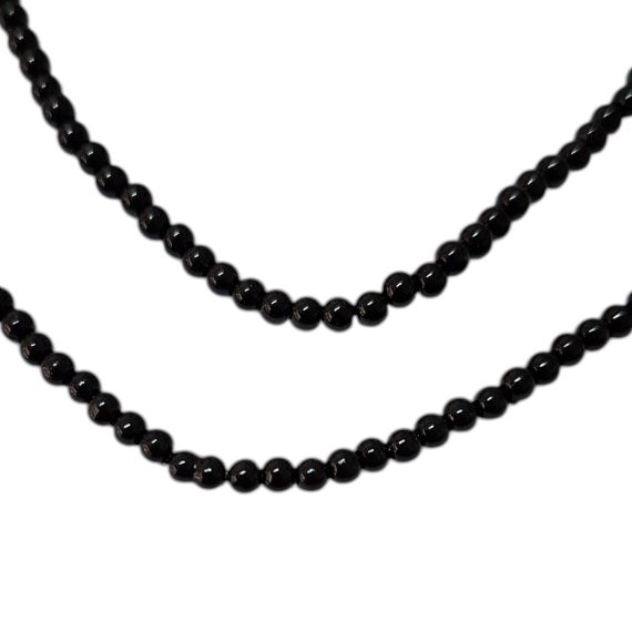MINI PERLA ACRILICA NEGRA 2 MM X TIRA (540 UNI APROX)