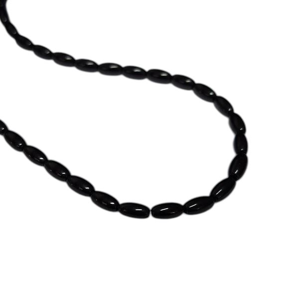 PERLA NEGRA VIDRIO CALIBRADA SEMILLA X TIRA (67 UNI APROX)